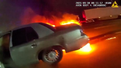 Hero cop pulls suspected drunk driver from burning car after she crashed