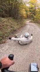 Cyclist Skids and Falls Hard While Attempting Slide
