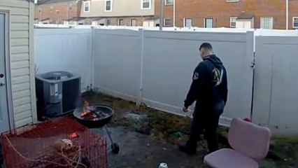 Man casually tosses can into fire and gets startled when it suddenly explodes