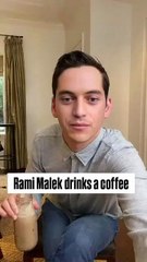 Rami Malek drinks a coffee