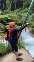 Man Awkwardly Falls Into Water After Rope Swing Jump