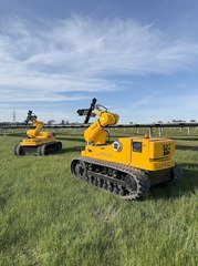 Robots helping build a solar farm with taxpayer support.