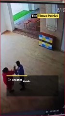 Greater Noida Shock: Woman Caught on CCTV Assaulting Security Guard at Presthem Society!