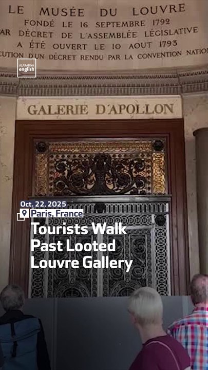 Tourists Walk Past Looted Louvre Gallery