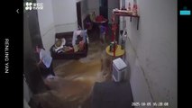Typhoon Matmo Floodwater Sweep Through Home