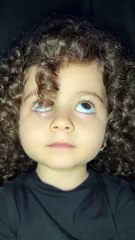 Curly-Haired Cuteness: Watch This Stylish Baby's Sweet Dance!