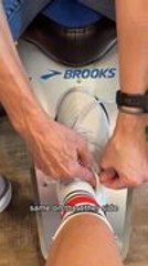 Store Associate Teaches Heel Lock Technique for Running Shoes