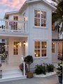 Coastal White Cottage – A Dream Home by the Sunset