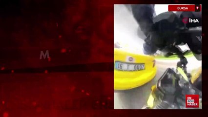 Bursa'da motosikletli, önünde duran taksiye çarptı
