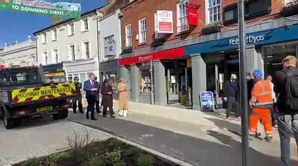 Kemi Badenoch MP meets a worker in Farnham's Downing Street