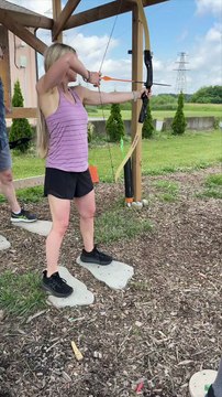 Her first time shooting a recurve bow — and she nails the bullseye! 🎯🏹