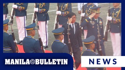 Marcos during departure honors before leaving for Malaysia to attend 47th Asean Summit