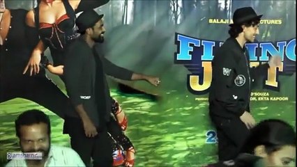 Tiger Shroff gets a little shy showing off his moves next to dance master Remo D’Souza. Humble vibes, superstar energy! 💃😅✨  #glamsham #tigershroff #remodsouza #dance #bollywood #funmoment #spotted #celebrityvibes  glamsham, tiger shroff, remo dsouza, d