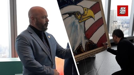 Foundation member George Kauper speaks at the unveiling of Port Authority police painting by David Banegas