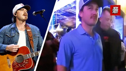 Police release bodycam footage showing Morgan Wallen arrest after throwing chair off bar roof