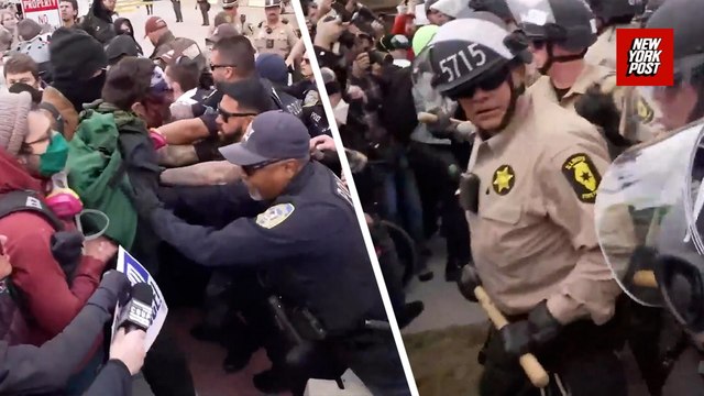 'They're hitting us with f–king sticks': Police scuffle with protestors outside Broadview ICE facility