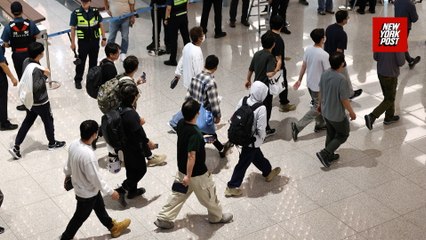 South Korean workers freed from US immigration raid return home