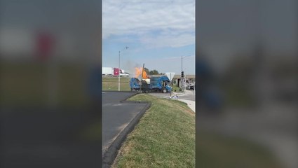 Watch as garbage truck erupts into flames