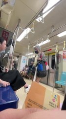 Shocking moment passenger kicks old woman across train