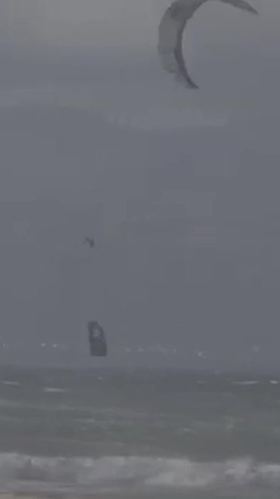 Kite surfer rescued after failed trick knocks him unconscious