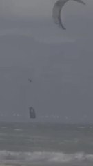 Kite surfer rescued after failed trick knocks him unconscious