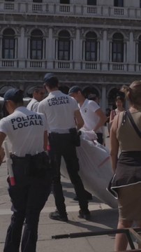 Activists display massive banner in Venice to protest Jeff Bezos' lavish destination wedding