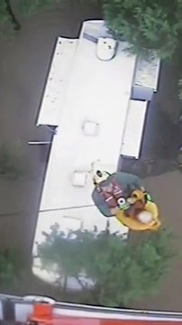Coast guard air lifts Texas residents from home amid deadly floods
