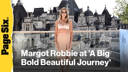 Margot Robbie wears vintage nude bra and skirt set for 'A Big Bold Beautiful Journey' photo call in London