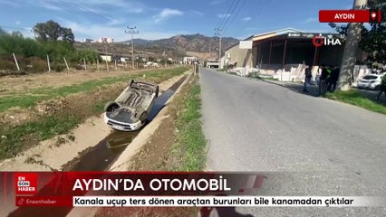 Aydın’da kanala uçup ters dönen araçtan burunları bile kanamadan çıktılar