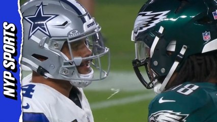Jalen Carter was ejected after the opening kickoff for spitting on Dak Prescott