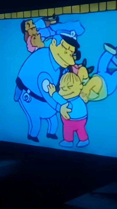 The Simpsons Ralph and Chief Wiggum hugging father and son