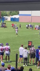 Russell Wilson connects with Malik Nabers on a deep pass at Giants camp