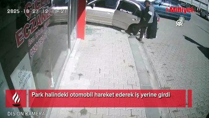 Park halindeki otomobil hareket ederek iş yerine girdi