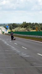 Heartwarming: Man Stops Highway Traffic to Rescue Injured Eagle/Bird!