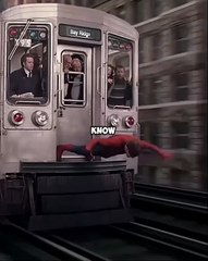 How does Spider-Man stick to the wall with his suit on?