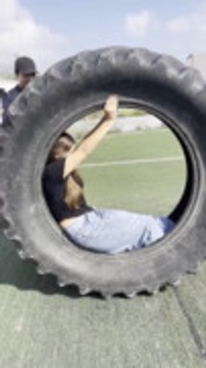 Woman Flips Over While Rolling Inside Tire