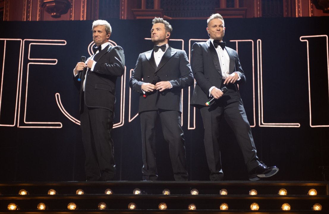 'We love him, we miss him...' Westlife pay tribute to missing member Mark Feehily at 25th anniversary concert in London