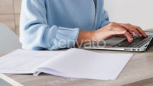 Laptop, paperwork and typing businesswoman in administration or human resources with invoice