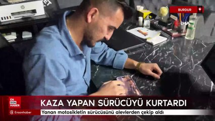 Burdur'da yanan motosikletin sürücüsünü alevlerden çekip aldı