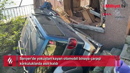 Sarıyer'de yokuştan kayan otomobil binaya çarpıp korkuluklarda asılı kaldı