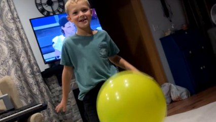 Exercise ball fail leads to young boy face-planting on the floor