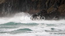 Powerful And Dangerous Waves Hitting The Rocky Cliff During Typhoon In Sandfly Bay, Dunedin, New Zea