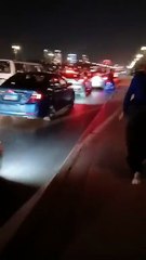 برج القاهرة يتزين باللون الأحمر تزامنا مع افتتاح المتحف الكبير