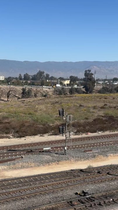 UP 5948 Leads Eastbound Stack Train Rolling Through West Colton Yard.