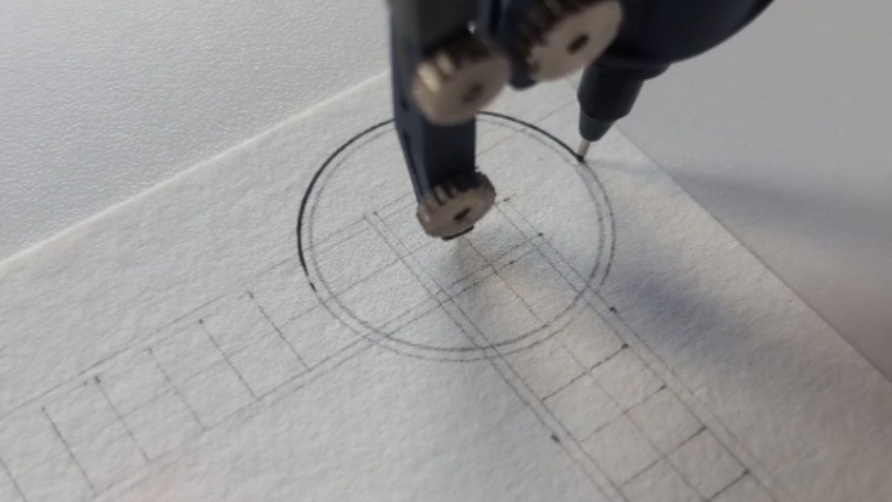 Artist makes Celtic knots and ornamental patterns with a compass, protractor, and ruler