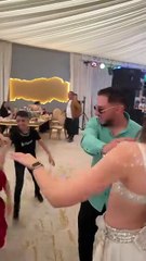 Vibrant Wedding Party Dance: Guests Tear Up the Dance Floor!