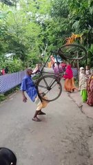 Unbelievable Feat of Strength: Man Lifts Full Bicycle with His Mouth!