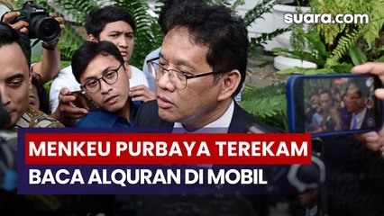 Di Sela Kesibukan, Menkeu Purbaya Terekam Baca Alquran di Dalam Mobil