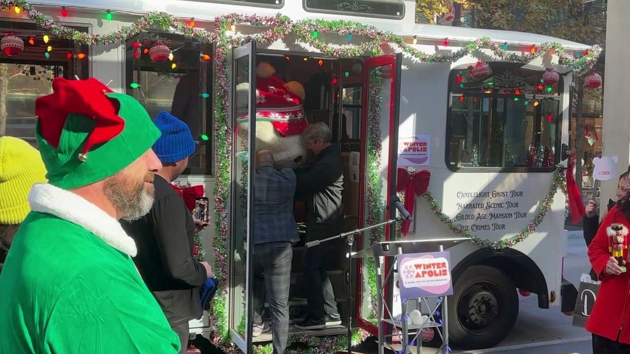 The Minneapolis "Winterapolis" trolley with former Mayor R.T. Rybak and a giant Santa Bear launch the holidays