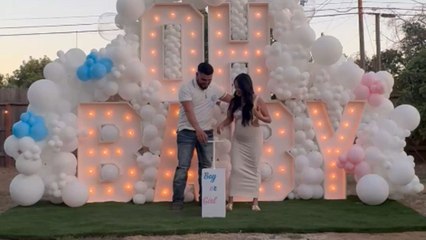 Excited parents-to-be capture their happiness after finding out the gender of baby